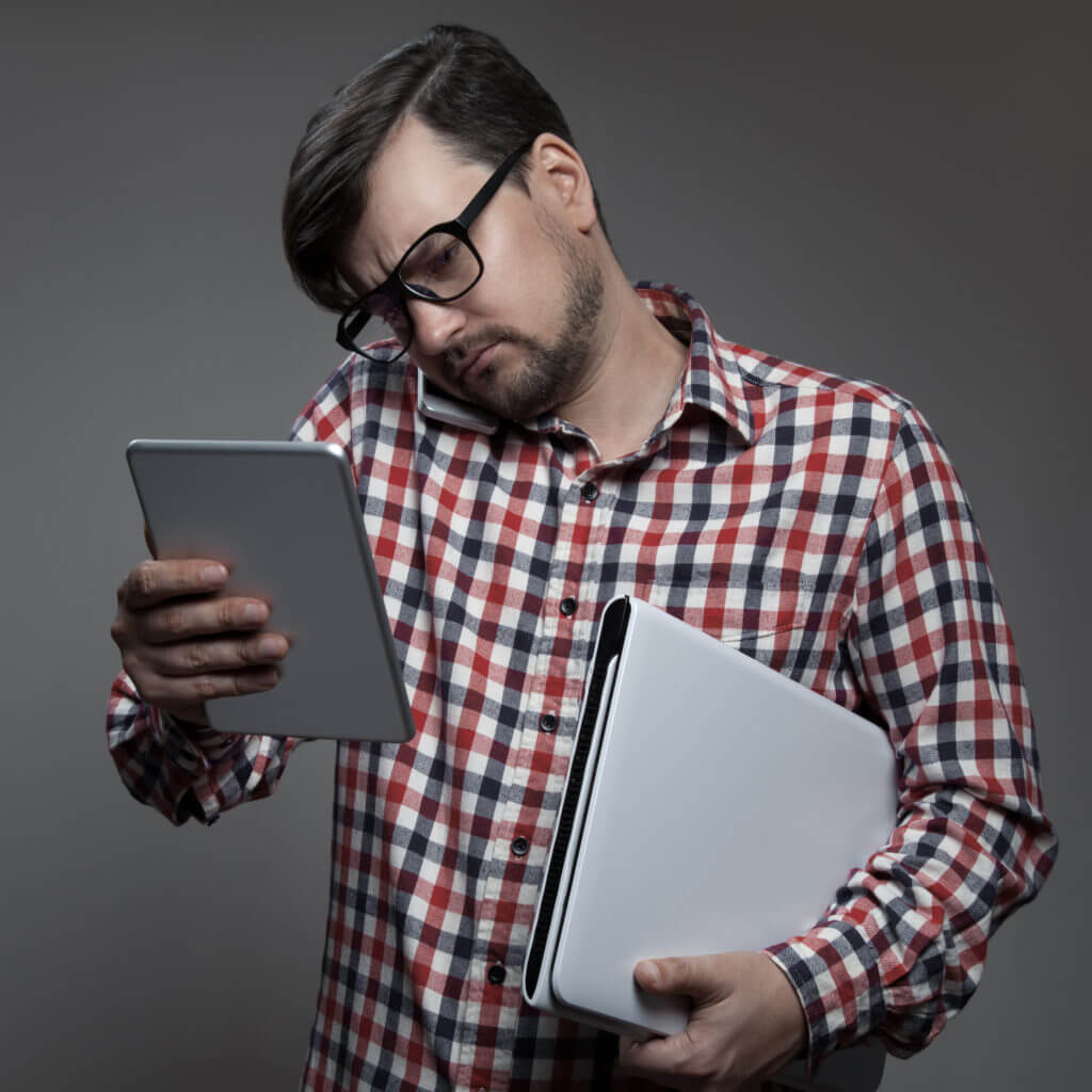 Man managing multiscreen world