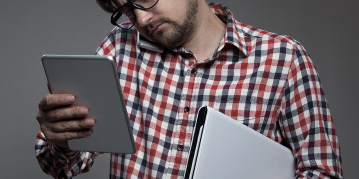 Man managing multiscreen world