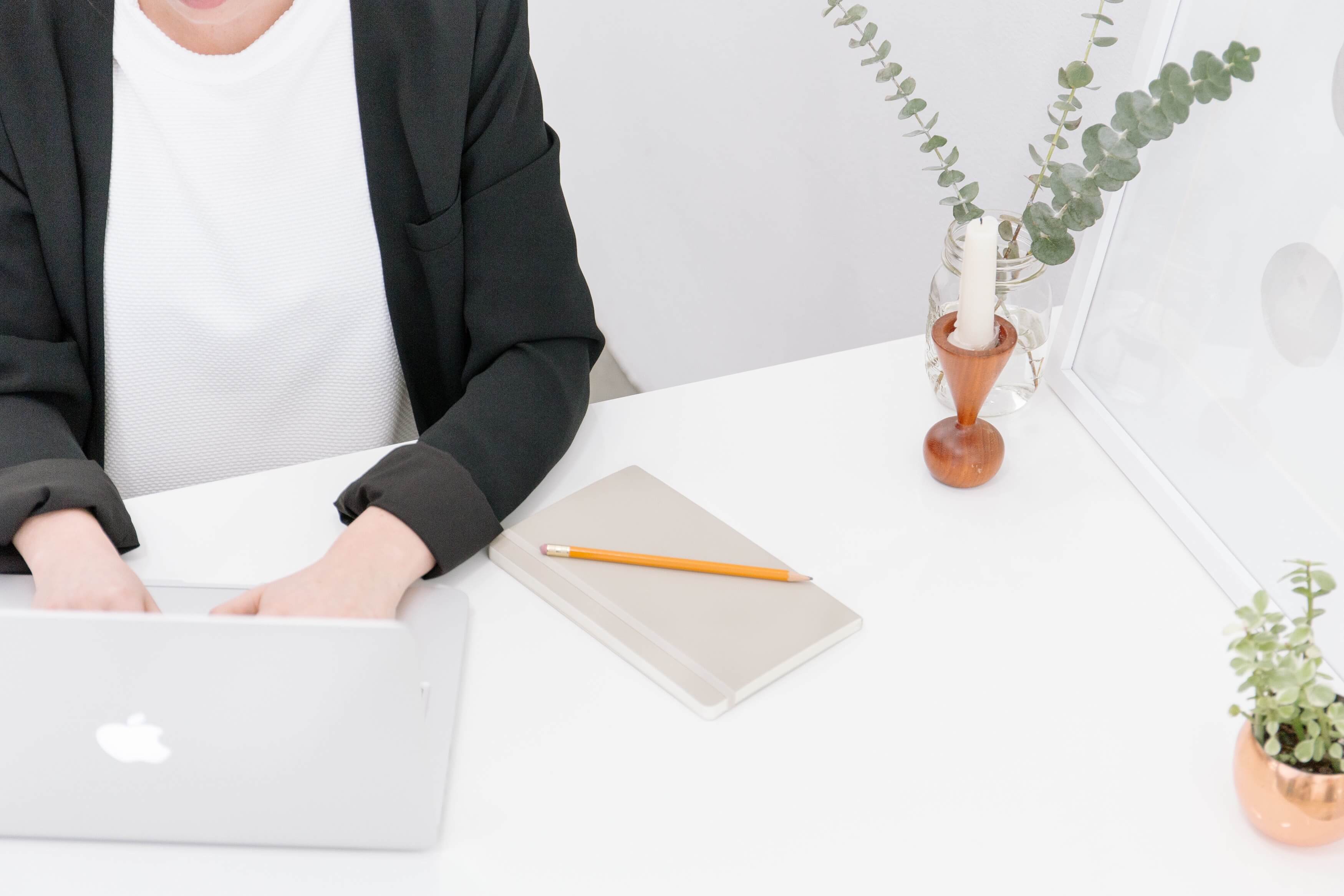 Woman working on laptop computer - Brands take marketing into their own hands 