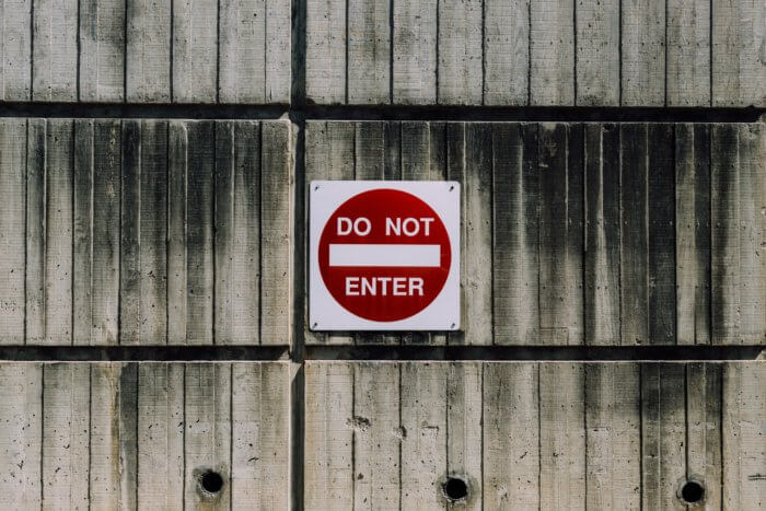 Do not enter sign on a wooden surface