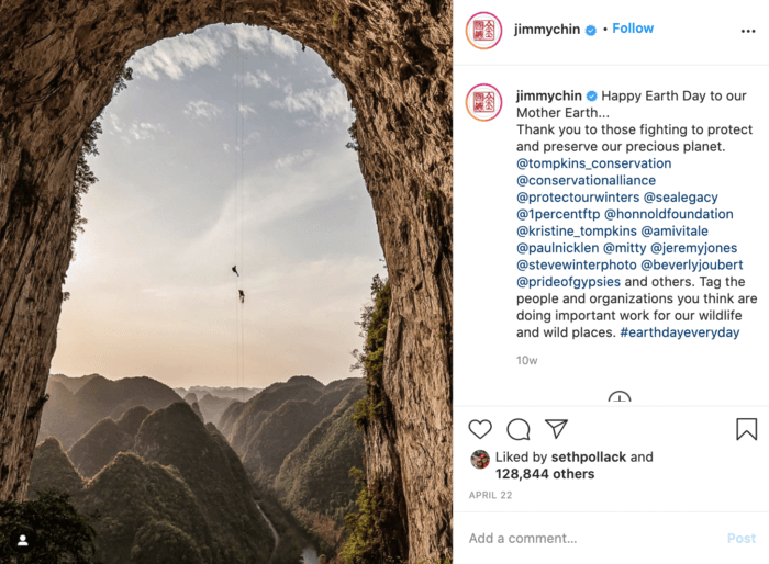 Earth Day Instagram post from influencer Jimmy Chin featuring two climbers repelling down over moutains