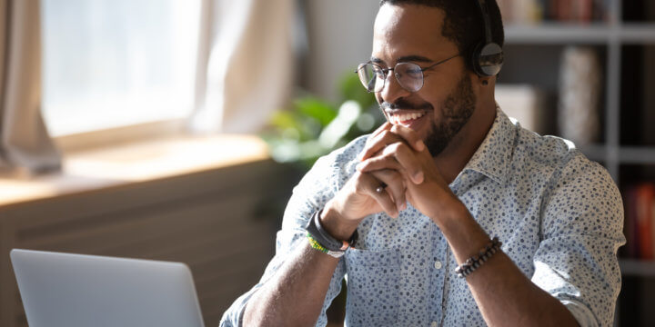 watching higher ed social media videos stock photo