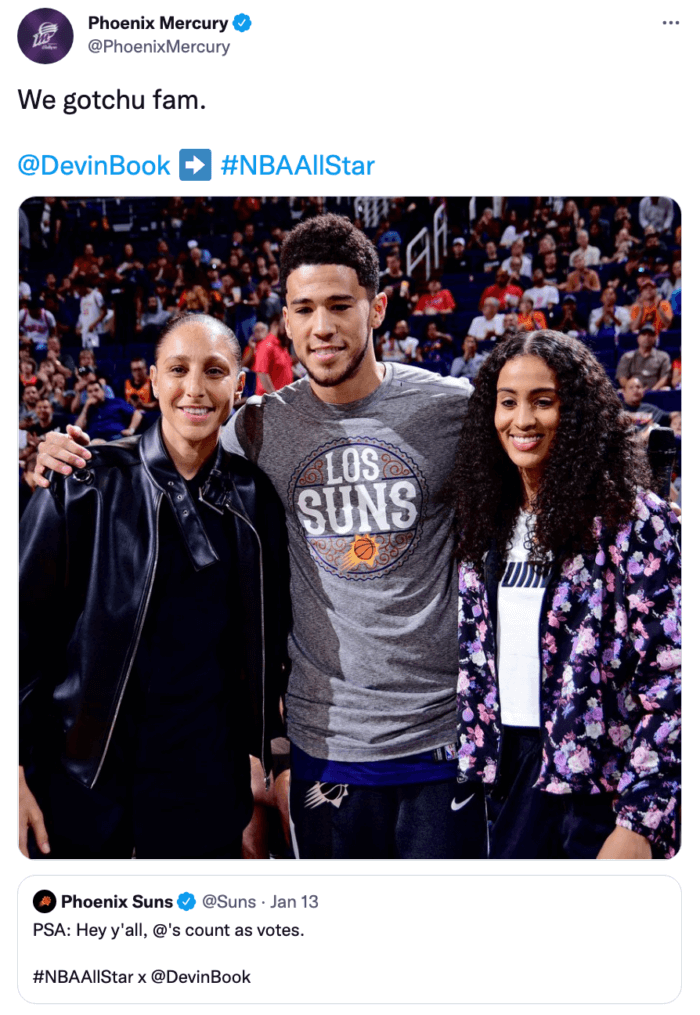 Phoenix Mercury players pose for a picture with Phoenix Suns player Devin Booker in this top-performing tweet.