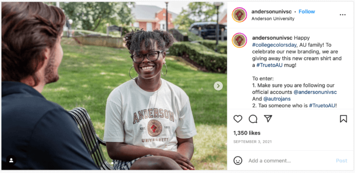 Student wearing a t-shirt with the AU logo on it, one of the giveaway items.