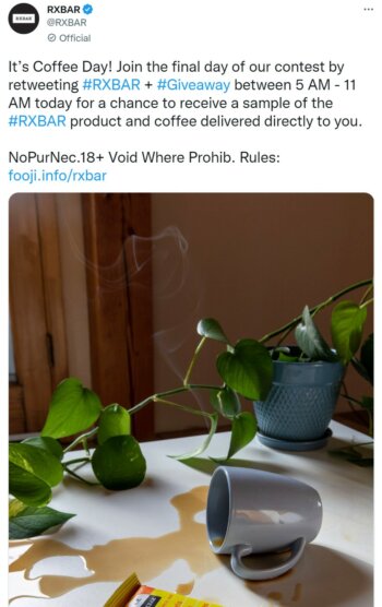 A spilt mug of coffee on a white table 